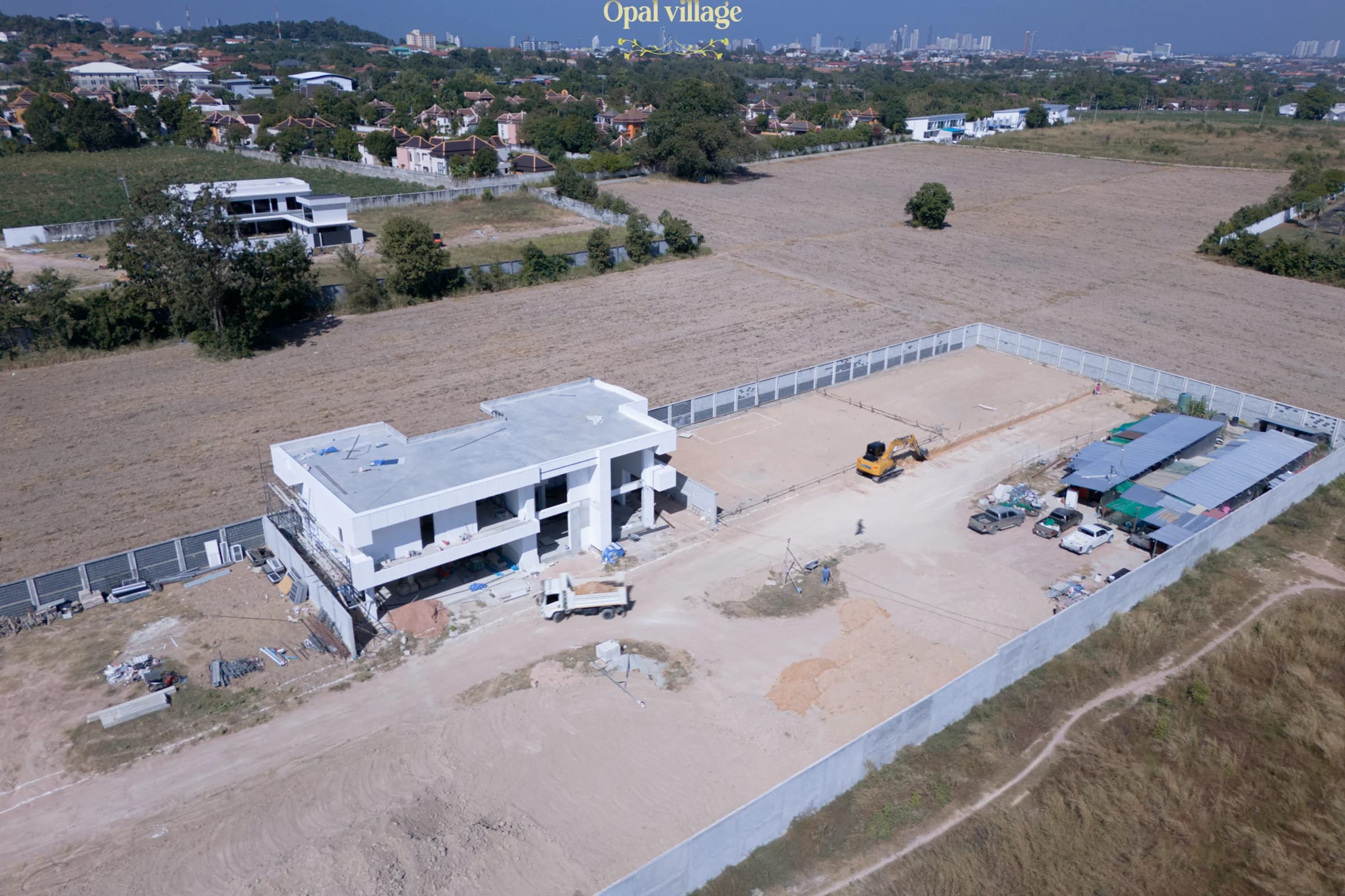 Ground floor slab and ground beam construction
