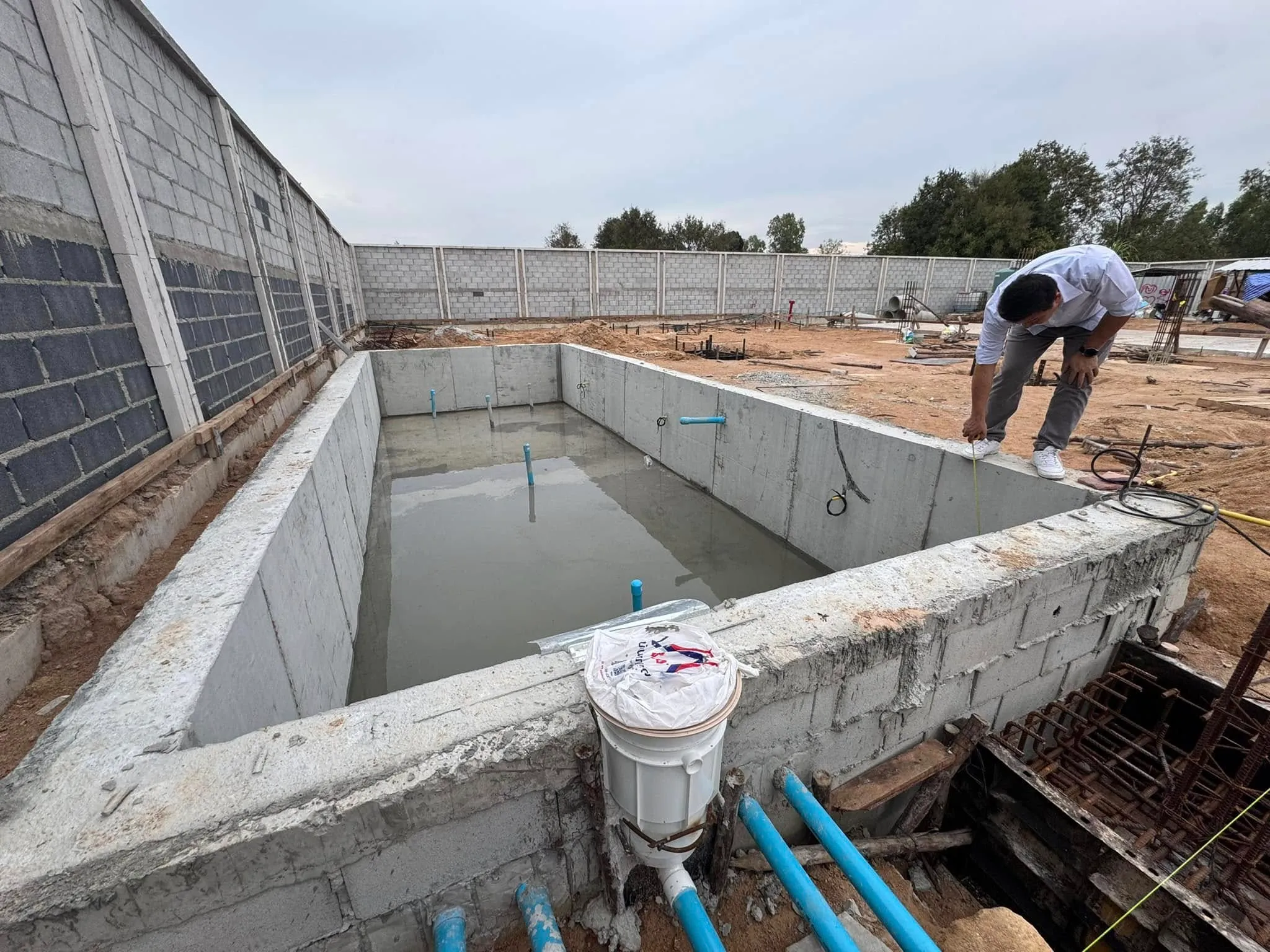 Pool tiling and filtration system installation